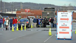West Virginia American Water customers line up for water at the Gestamp Plant after waiting hours for a water truck only to have it emptied in about 20 minutes on Jan 10 in South Charleston W Va The lives of 300000 people were disrupted and schools and businesses were closed for days following the chemical leak from Freedom Industries and subsequent water contamination Photo by Tom HindmanGetty Images West Virginia American Water customers line up for water at the Gestamp Plant after waiting hours for a water truck only to have it emptied in about 20 minutes on Jan 10 in South Charleston W Va The lives of 300000 people were disrupted and schools and businesses were closed for days following the chemical leak from Freedom Industries and subsequent water contamination Photo by Tom HindmanGetty Images