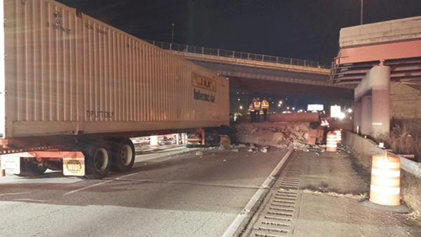 The driver of this truck barely escaped serious injury when a bridge over I75 in Cincinnati collapsed on Jan 15