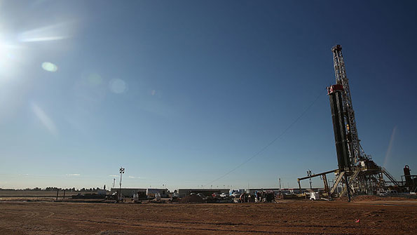 A fracking site on the outskirts of town in the Permian Basin oil field of Midland Texas