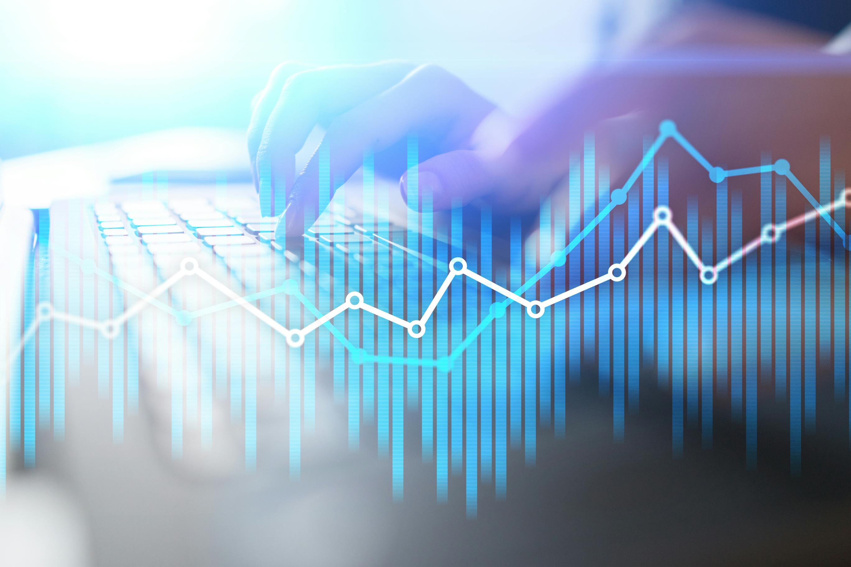 illustration of data and charts with keyboard and human hand in background