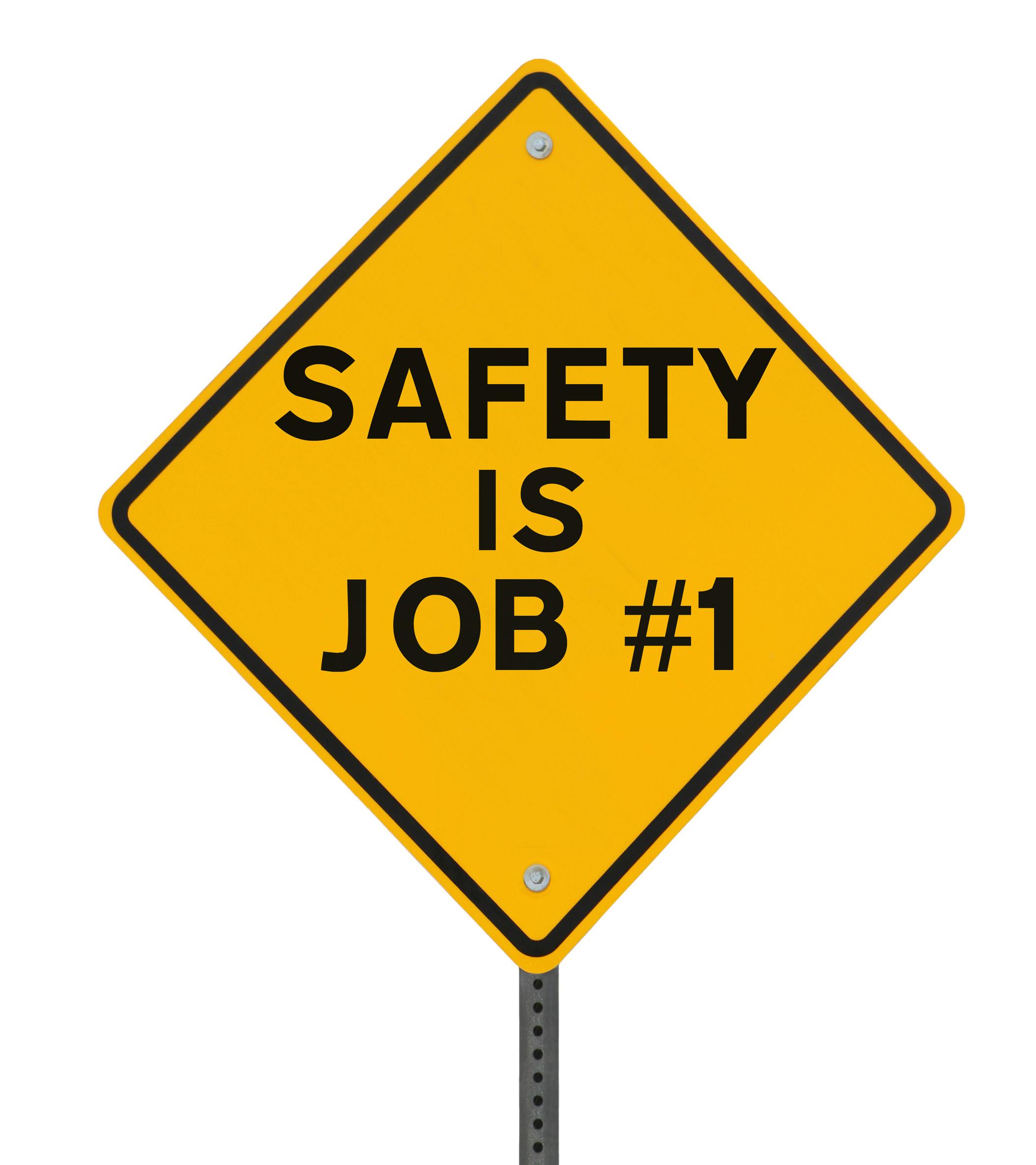 yellow road sign that reads: 'Safety is Job number 1'