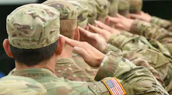 soldiers in formation with their right arms raised to salute soldiers in formation with their right arms raised to salute