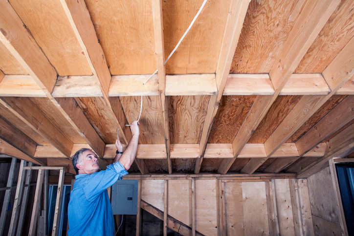 Electrician pulling wire