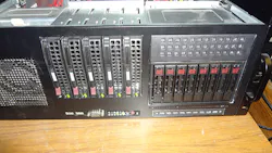 Figure 4. Normally the rack would be mounted right side up so the alignment of the hot swap drive buttons would be the same as the 3.5-in drives on the left but the rack has to be mounted upside down. Figure 4. Normally the rack would be mounted right side up so the alignment of the hot swap drive buttons would be the same as the 3.5-in drives on the left but the rack has to be mounted upside down.