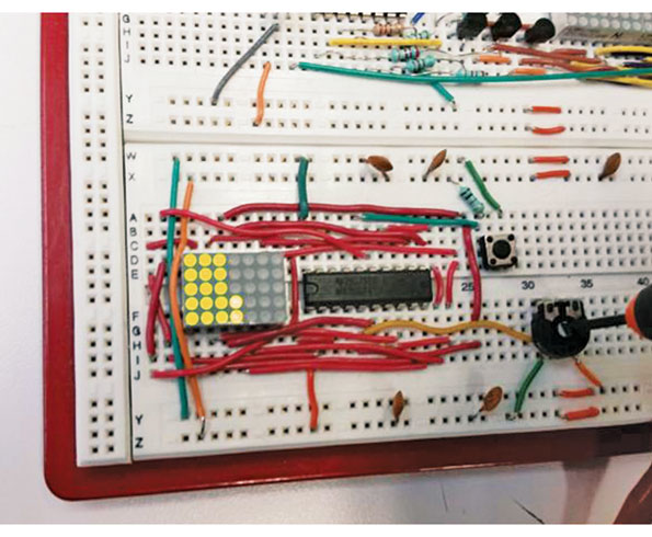 The algorithm in this microcontroller design this design drives an LED matrix and provides digitalvoltagereadout and barlike dot displays showing dots for a graphical output if the input value is changing and switching automatically to displaying a numeric value when the input voltage is stable