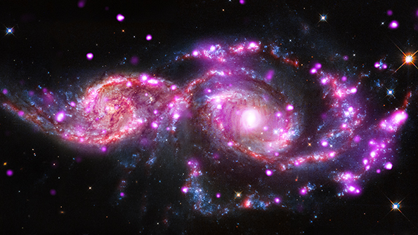This composite image of NGC 2207 and IC 2163 contains data from Chandra NASA39s Hubble Space Telescope and the Spitzer Space Telescope Image courtesy of NASA