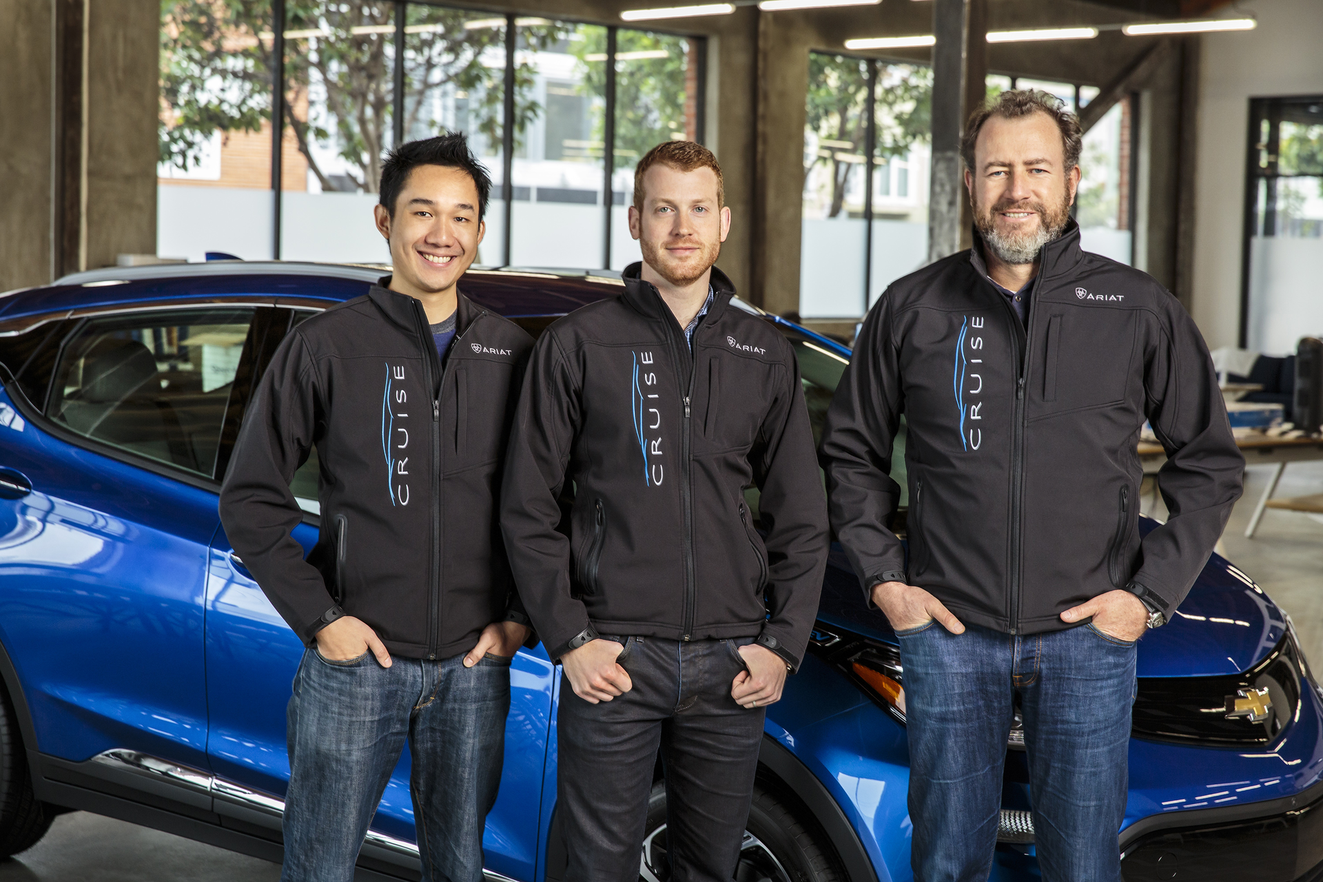 From right to left GM President Dan Ammann stands with Cruise Automation founder Kyle Vogt and chief operations officer Daniel Kan GM agreed to buy Cruise as part of its efforts to develop selfdriving cars Image courtesy of GM