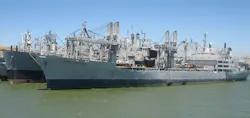Tesla has acquired three mothballed freighters from the Navy's Reserve Fleet and converted them into a floating, vertically integrated production facility for its lithium batteries. (Credit: By Earthpig - Own work, CC BY-SA 3.0, https://commons.wikimedia.org/w/index.php?curid=15900615) Tesla has acquired three mothballed freighters from the Navy's Reserve Fleet and converted them into a floating, vertically integrated production facility for its lithium batteries. (Credit: By Earthpig - Own work, CC BY-SA 3.0, https://commons.wikimedia.org/w/index.php?curid=15900615)