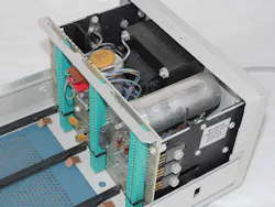 3. The TM503 has a linear power supply in the back that feeds dc and low-voltage ac power to the plug-in modules. 3. The TM503 has a linear power supply in the back that feeds dc and low-voltage ac power to the plug-in modules.