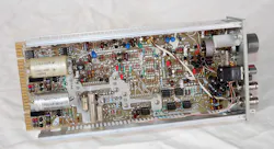 6. The component side of the FG502 function generator PCB has several LM741 operational amplifiers in sockets, as well as other power-supply and signal-path components. 6. The component side of the FG502 function generator PCB has several LM741 operational amplifiers in sockets, as well as other power-supply and signal-path components.