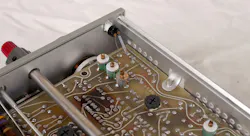 8. The pilot light mounts to the front panel. Note the burnt area in the foreground due to overheated resistors. 8. The pilot light mounts to the front panel. Note the burnt area in the foreground due to overheated resistors.