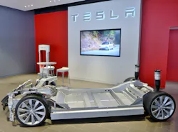 This image of a Tesla chassis and battery pack provides some idea of the space limitations in many EV applications as well as the large scale of battery packs—dual realities that shape current monitoring. This image of a Tesla chassis and battery pack provides some idea of the space limitations in many EV applications as well as the large scale of battery packs—dual realities that shape current monitoring.