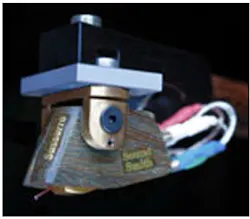 Figure 10. The Sussurro moving-iron cartridge from Soundsmith also resides in a wooden body, employs a nude contact line diamond stylus, and weighs 8.79 g. Figure 10. The Sussurro moving-iron cartridge from Soundsmith also resides in a wooden body, employs a nude contact line diamond stylus, and weighs 8.79 g.