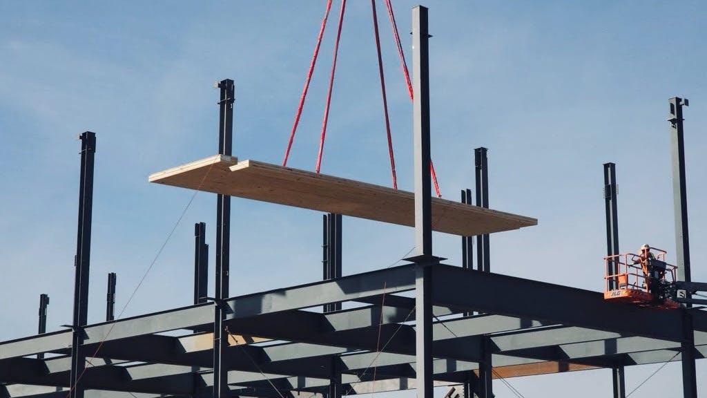Cross laminated timber being installed along steel beams at Microsoft's new data center construction in Virginia. Image credit Microsoft.com