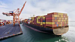 Aerial view of cargo ship in transit Aerial view of cargo ship in transit