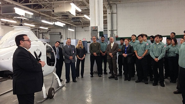 Ed Caban lead program engineer for the New York Power Authority NYPA addresses a group of government officials and students from Aviation High School in Queens at John F Kennedy International Airport