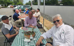 Lee (left) at a Swift Electrical Supply get-together. Lee (left) at a Swift Electrical Supply get-together.