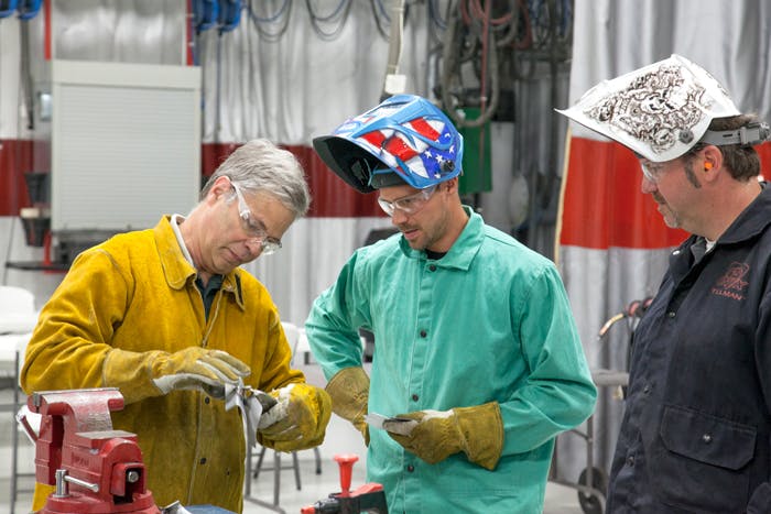 Figure 4 &ndash; I-CAR instructors work closely with technicians to they have the knowledge and skills to successful complete MIG braze joints.