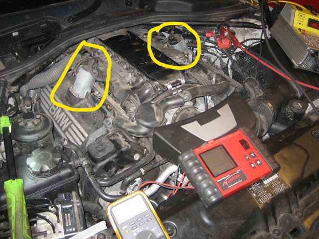 The valvetronic servo-motors are circled and clearly visible in this photo of a 550i, N62 4.8 Liter V/8 engine.