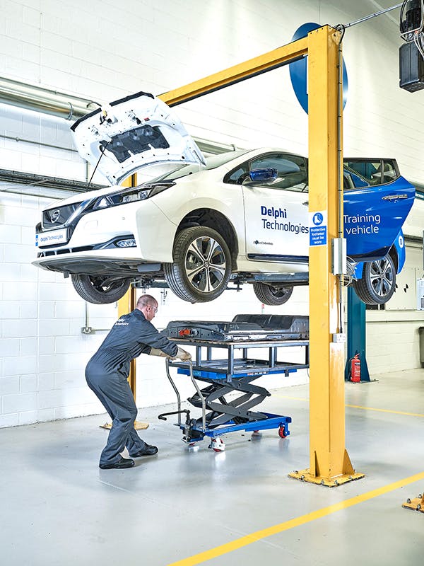 Before you begin repairing EVs, you will need some very specific equipment, including a high-voltage lift table.