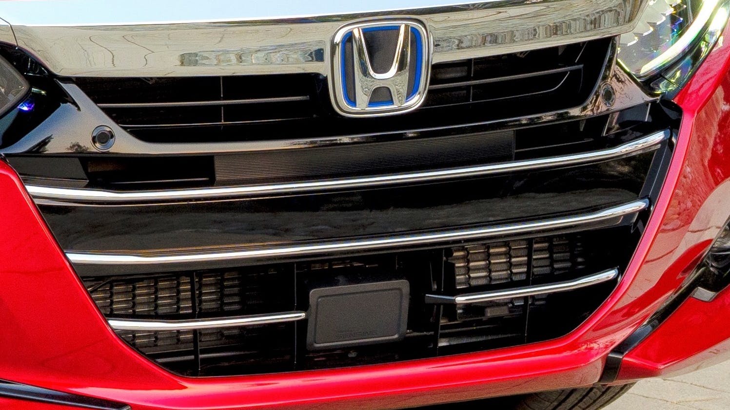 The Honda Accord has a standalone sensor in the lower grille.