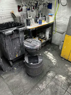 This paint mix room shows a couple violations: the plastic trash can needs to be a metal one with a closed metal lid, and the liquid solvent paint-waste container needs to be grounded and include a waste-paint label. This paint mix room shows a couple violations: the plastic trash can needs to be a metal one with a closed metal lid, and the liquid solvent paint-waste container needs to be grounded and include a waste-paint label.