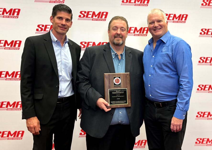 Figure 2- (left to right) Dirk Fuchs, I-CAR Director, Technical Programs & Services, and Bud Center, I-CAR Director, Technical Products & Curriculum, accepting the award receiving runner-up recognition for SEMA Best New Products Advanced Driver Assistance System (ADAS) product category.