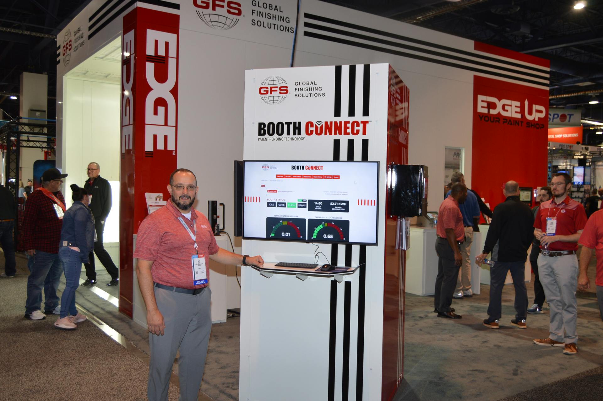 Matt Salvo, vice president of the aftermarket business unit at Global Finishing Solutions, shows on a monitor a sample of the data that can be collected from the company's Booth Connect, which debuted at the SEMA Show along with the new Edge paint booth.