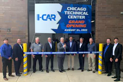 I-CAR’s Board of Directors Chair Kyle Thompson (center) is shown ready to cut the ribbon at the main entrance to the 48,000-square-foot facility. He is flanked by members of I-CAR’s leadership, including CEO & President John Van Alstyne (fourth from right). From l. are Mike Mertes, Tom Marek, James Busam, Jeff Peevy, Thompson, Tim O’Day, Van Alstyne, Jon Petrillo, Bud Center, and Dirk Fuchs. I-CAR’s Board of Directors Chair Kyle Thompson (center) is shown ready to cut the ribbon at the main entrance to the 48,000-square-foot facility. He is flanked by members of I-CAR’s leadership, including CEO & President John Van Alstyne (fourth from right). From l. are Mike Mertes, Tom Marek, James Busam, Jeff Peevy, Thompson, Tim O’Day, Van Alstyne, Jon Petrillo, Bud Center, and Dirk Fuchs.