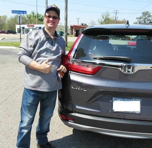 Paul Blais with his newly repaired vehicle from Maaco Hampton.