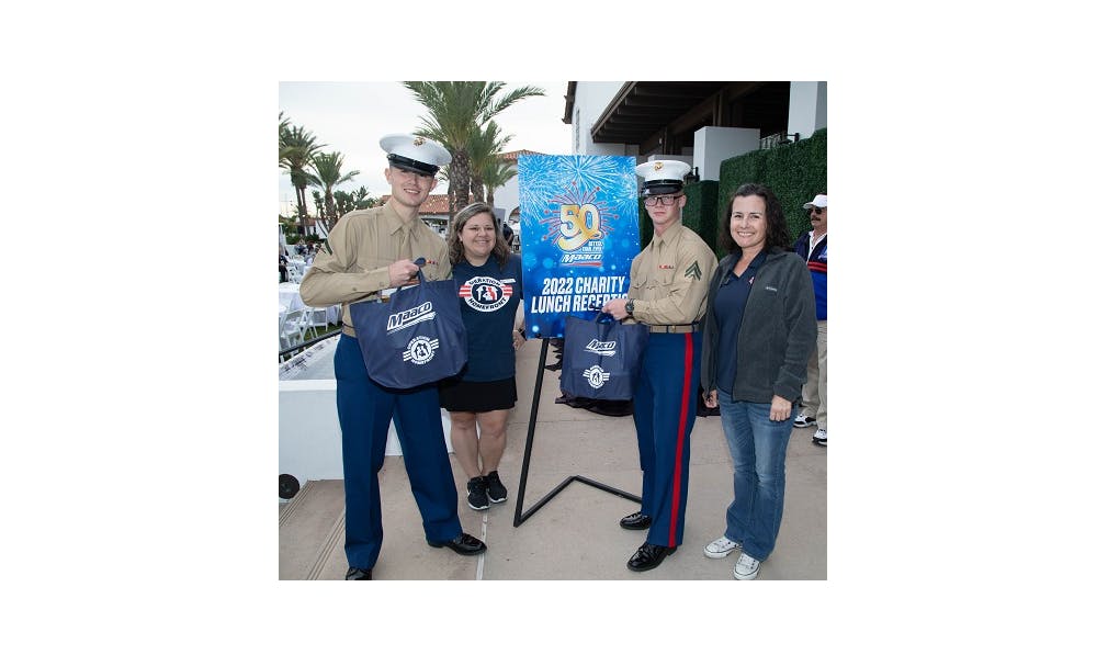 Marines from Marine Corps Air Station, Miramar, join representatives from Operation Homefront