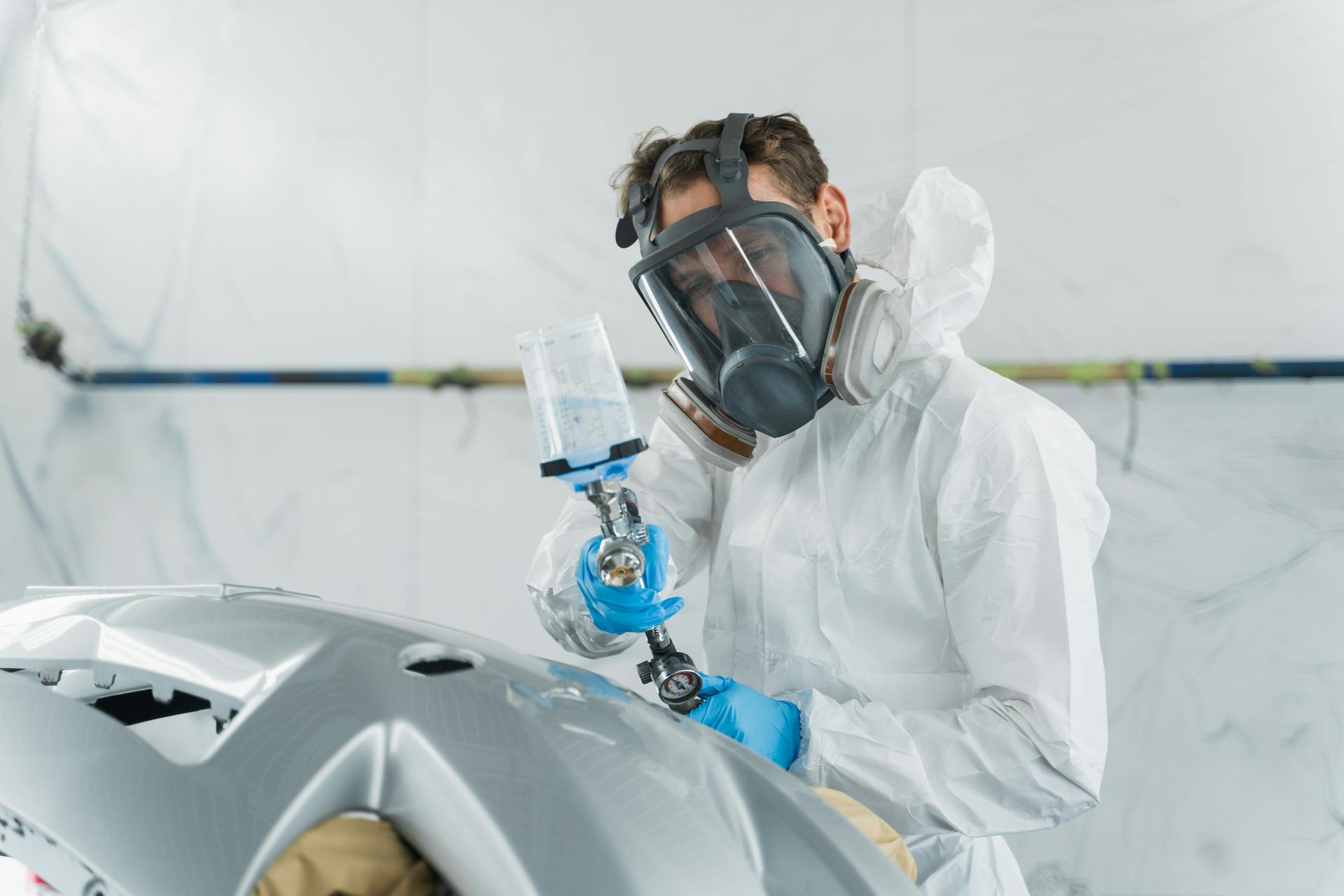 Young automotive painter