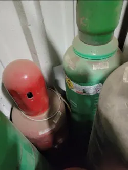 KEEP SEPARATE: Oxygen and acetylene bottles must not be stored together, as shown here. KEEP SEPARATE: Oxygen and acetylene bottles must not be stored together, as shown here.