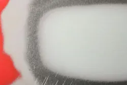 Properly feathered-out and pinhole-free body filler. Properly feathered-out and pinhole-free body filler.