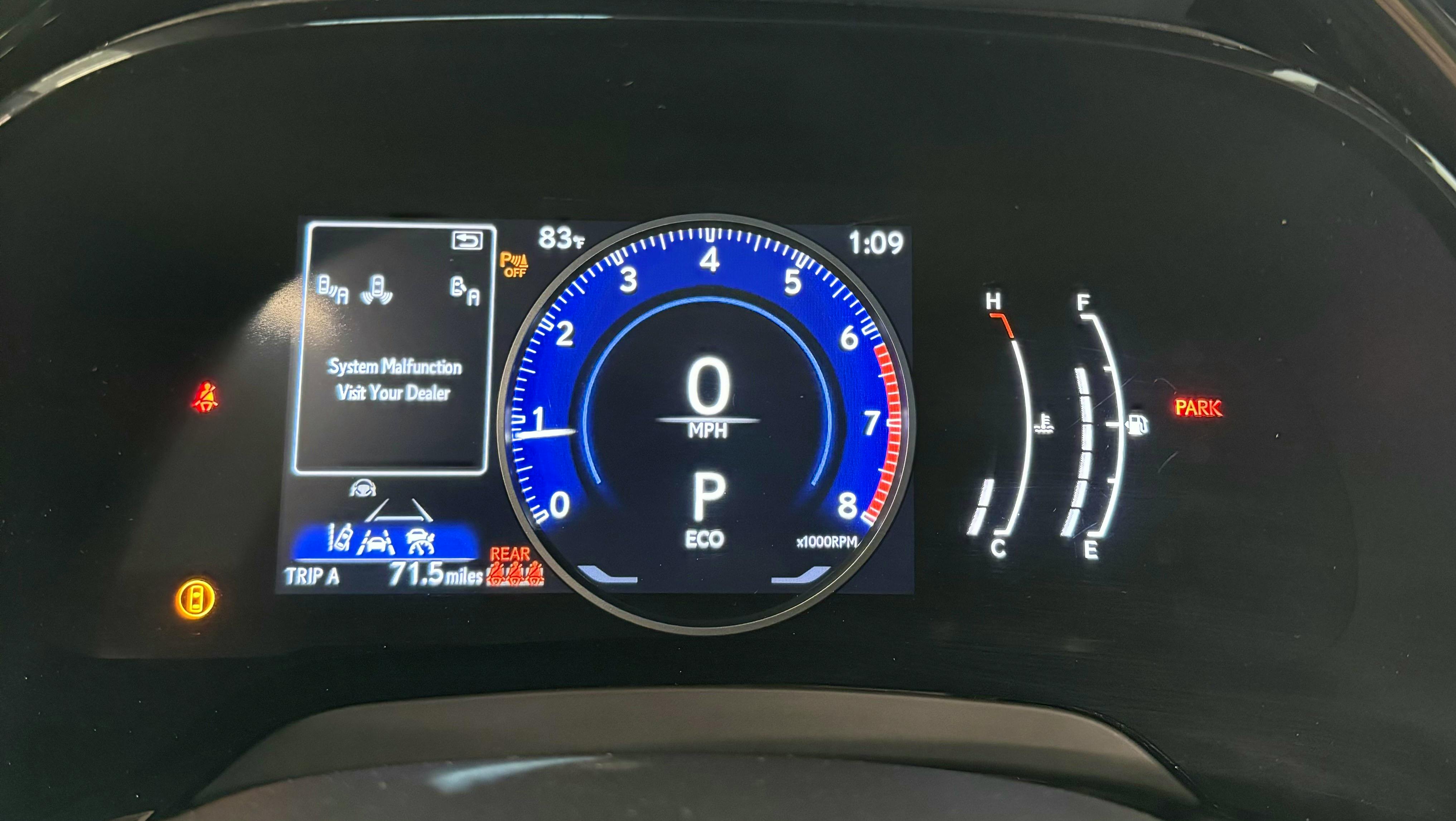 FIGURE 2: When the author started the car, icons were illuminated, warning the rear side blind spot system and park assist were off.