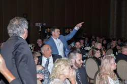 Attendees of the gala bid during the charity auction. Attendees of the gala bid during the charity auction.