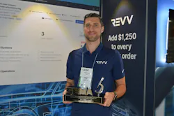 Mike Fitch, vice president of revenue for Revv ADAS, holds the trophy for Best ADAS Product after the SEMA Best New Products Awards. Mike Fitch, vice president of revenue for Revv ADAS, holds the trophy for Best ADAS Product after the SEMA Best New Products Awards.