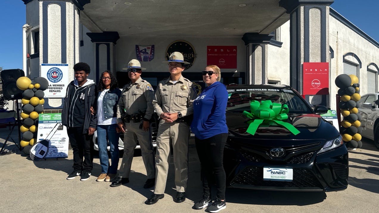 From left: Letitia Salazar, two Riverside sheriff&rsquo;s deputies who attended the event, Sophia Heard and her son.
