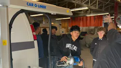 Students at Ogden High School gather to interact with the new Car-O-Liner resistance spot welder. Students at Ogden High School gather to interact with the new Car-O-Liner resistance spot welder.