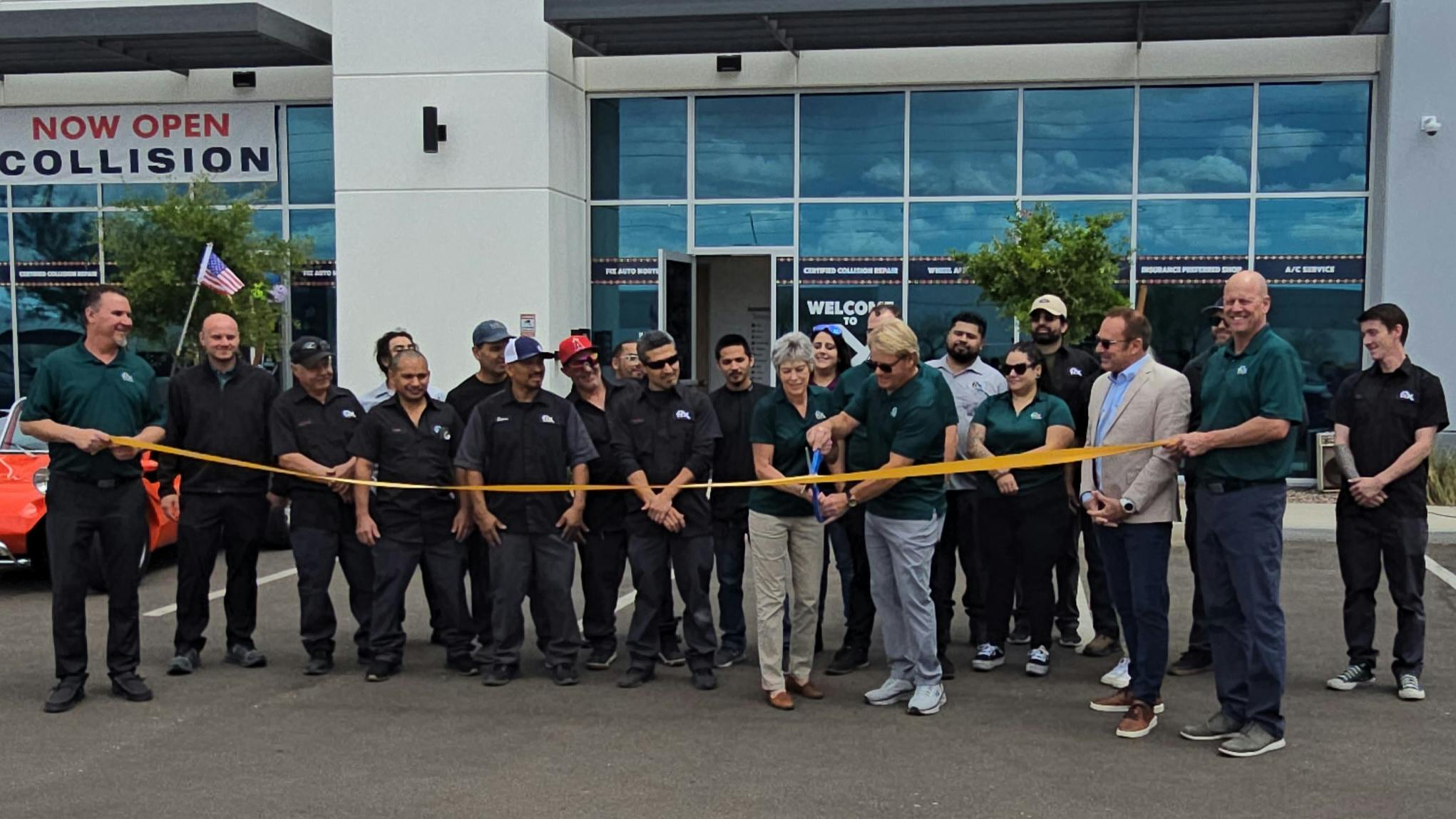 Fix Auto Norterra Owners Ron and Lynn Werner cut the ribbon during the grand opening celebration earlier this month.