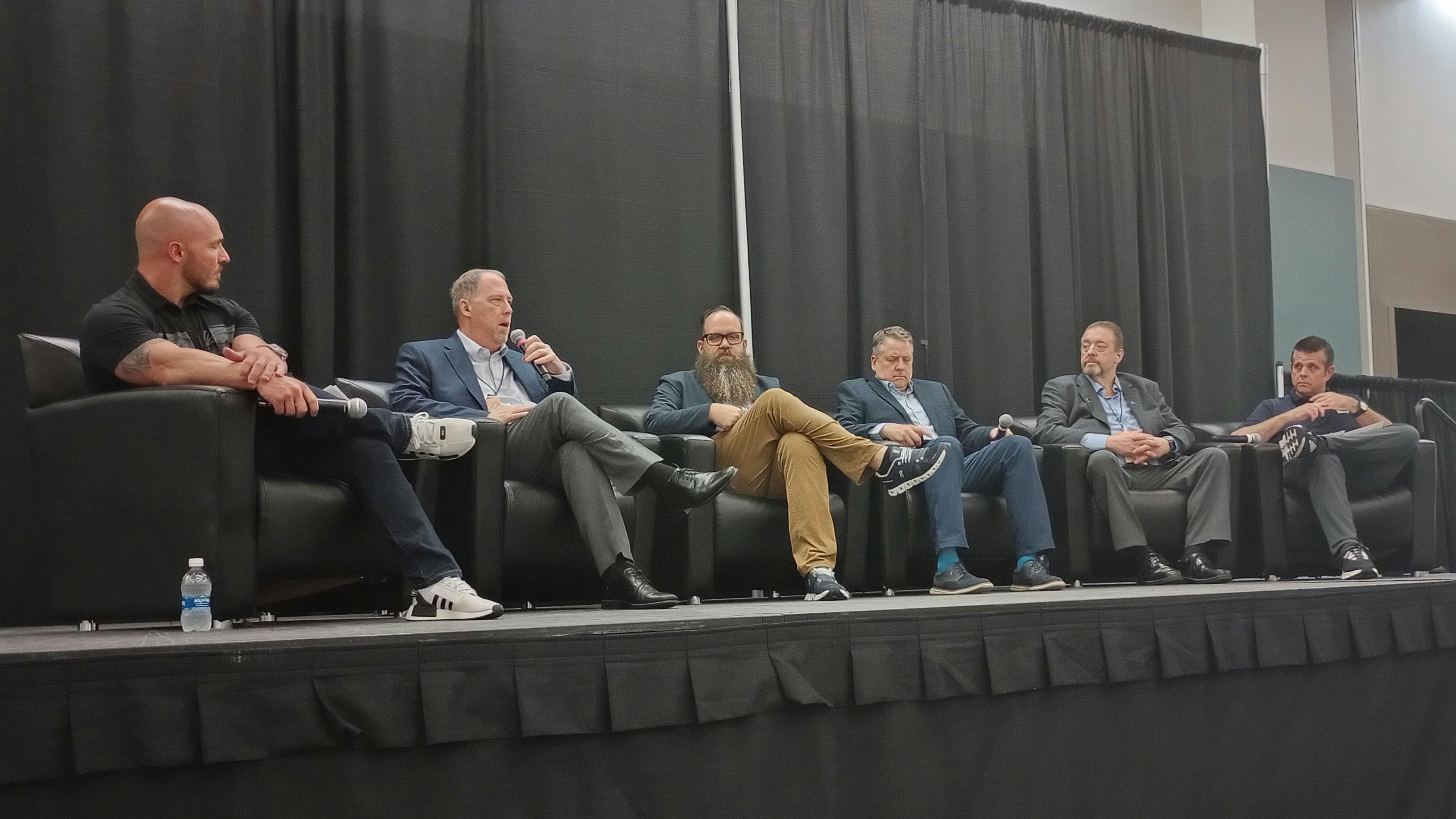 From left, Kyle Bradshaw, Dave Rounkles, Casey Hamilton, John Eck, Bud Center, and Barry Dorn discuss OEM industry relations in a lunch & learn panel discussion.