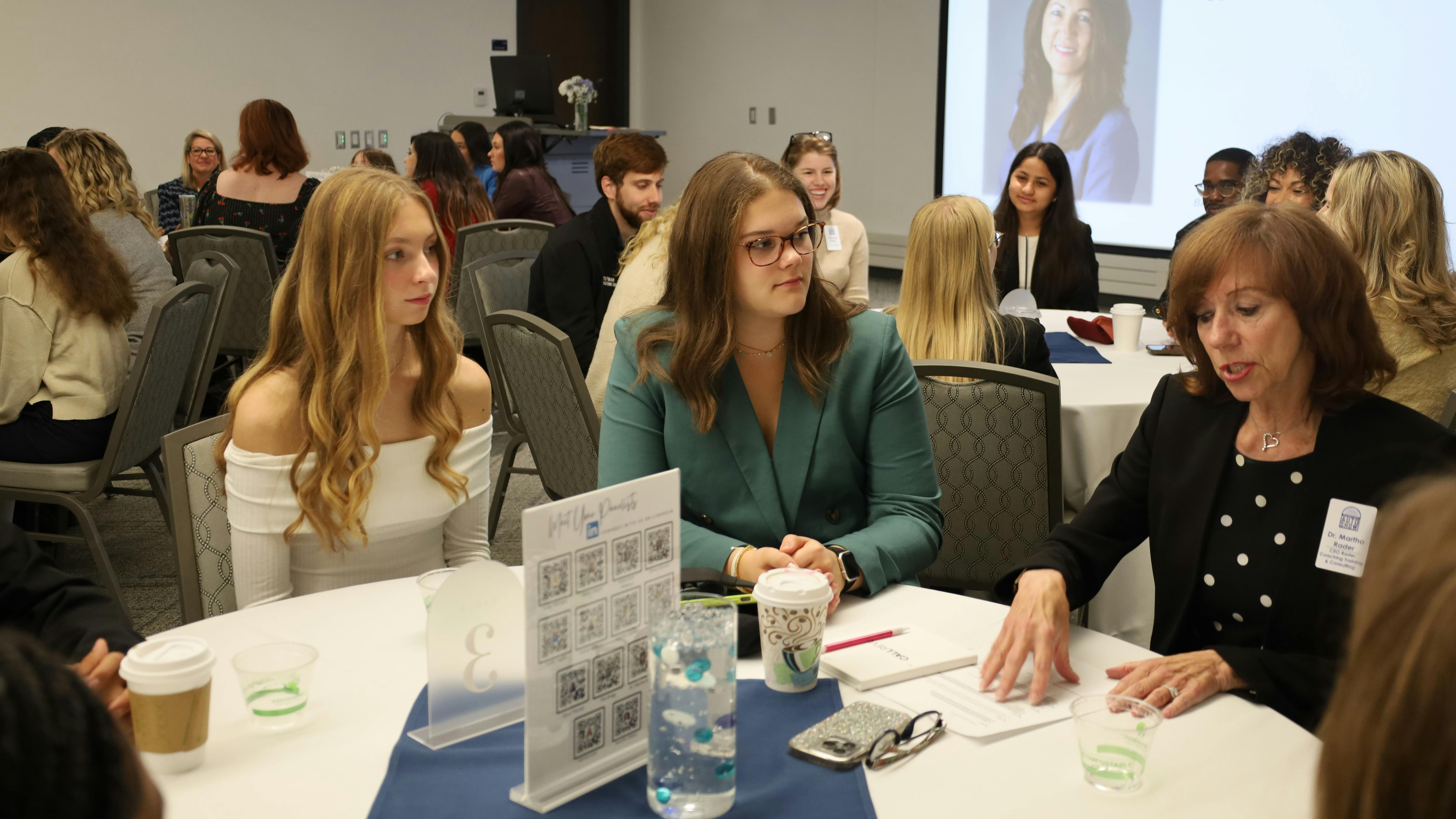 Northwood University students interact with industry professionals during the Driven by Women Automotive Roundtable at the 2024 Northwood University International Auto Show.