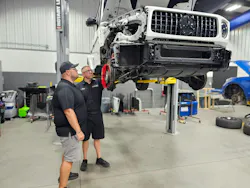 TECHNICIAN REVIEW: Barkley reviews the repair plan with the technician disassembling the vehicle, outlining key steps and each stage of the repair process. TECHNICIAN REVIEW: Barkley reviews the repair plan with the technician disassembling the vehicle, outlining key steps and each stage of the repair process.