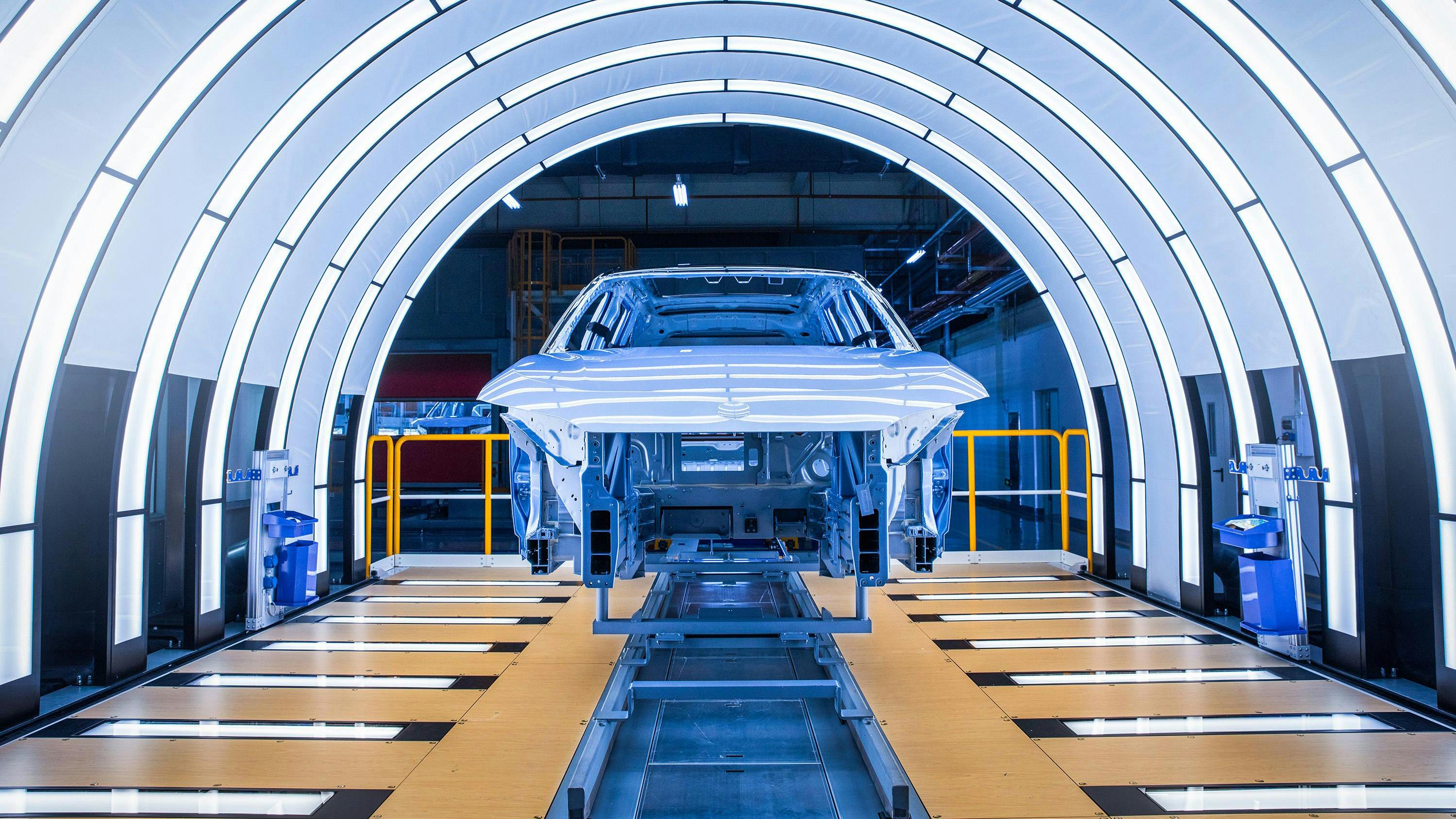 Coatings for this full aluminum car body include BASF Oxsilan thin film pretreatment, CathoGuard 800 e-coat, waterborne primer, waterborne basecoat, and a two-component clear coat.