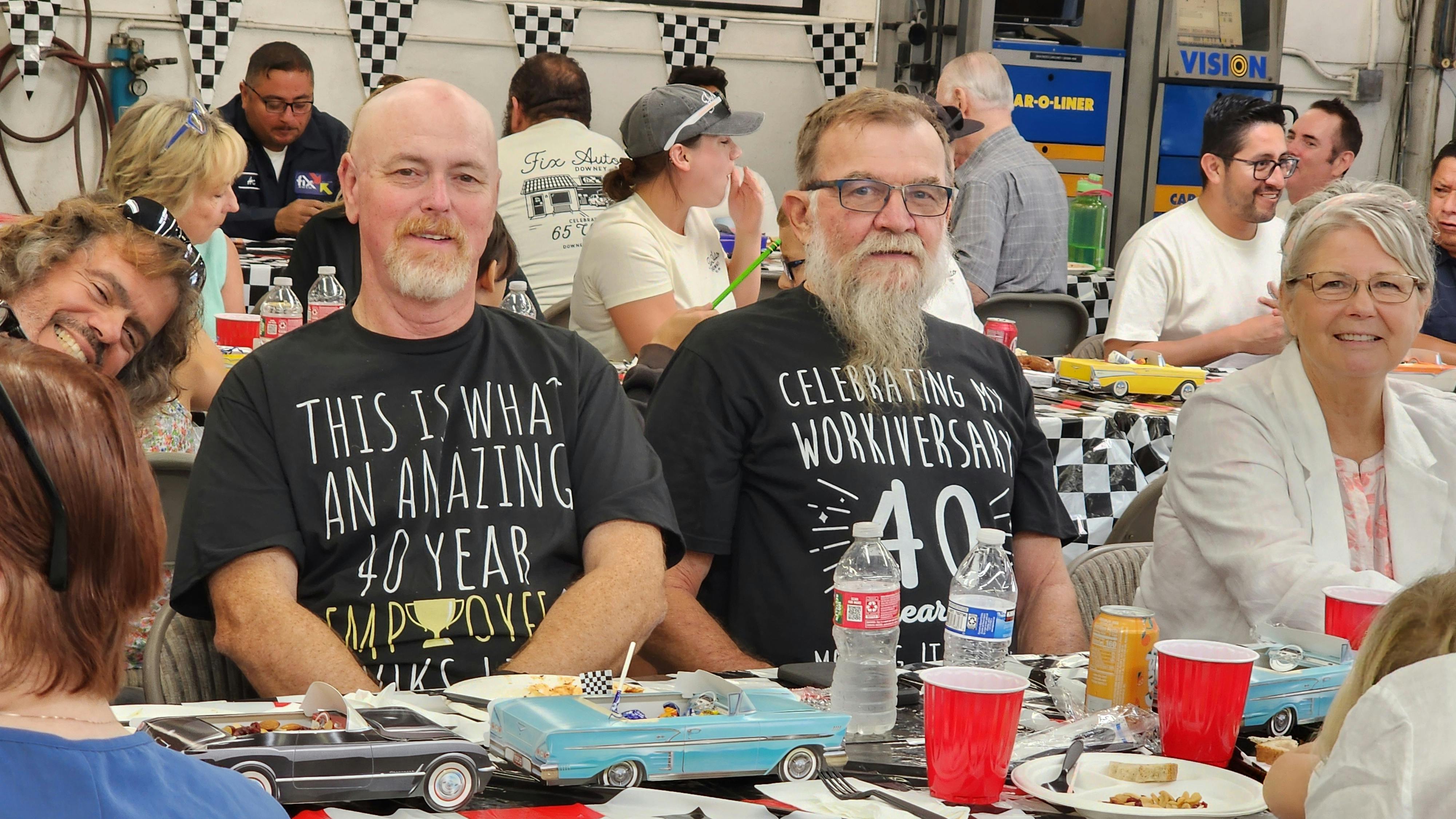 Fix Auto Downey's AJ Gatson, left, and David Shubin celebrated 40 years of service during the shop's 65th anniversary celebration on July 18.