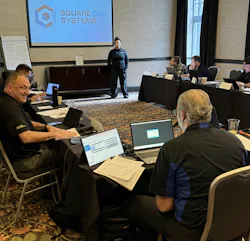 Kristen Henry leads a training group. Kristen Henry leads a training group.