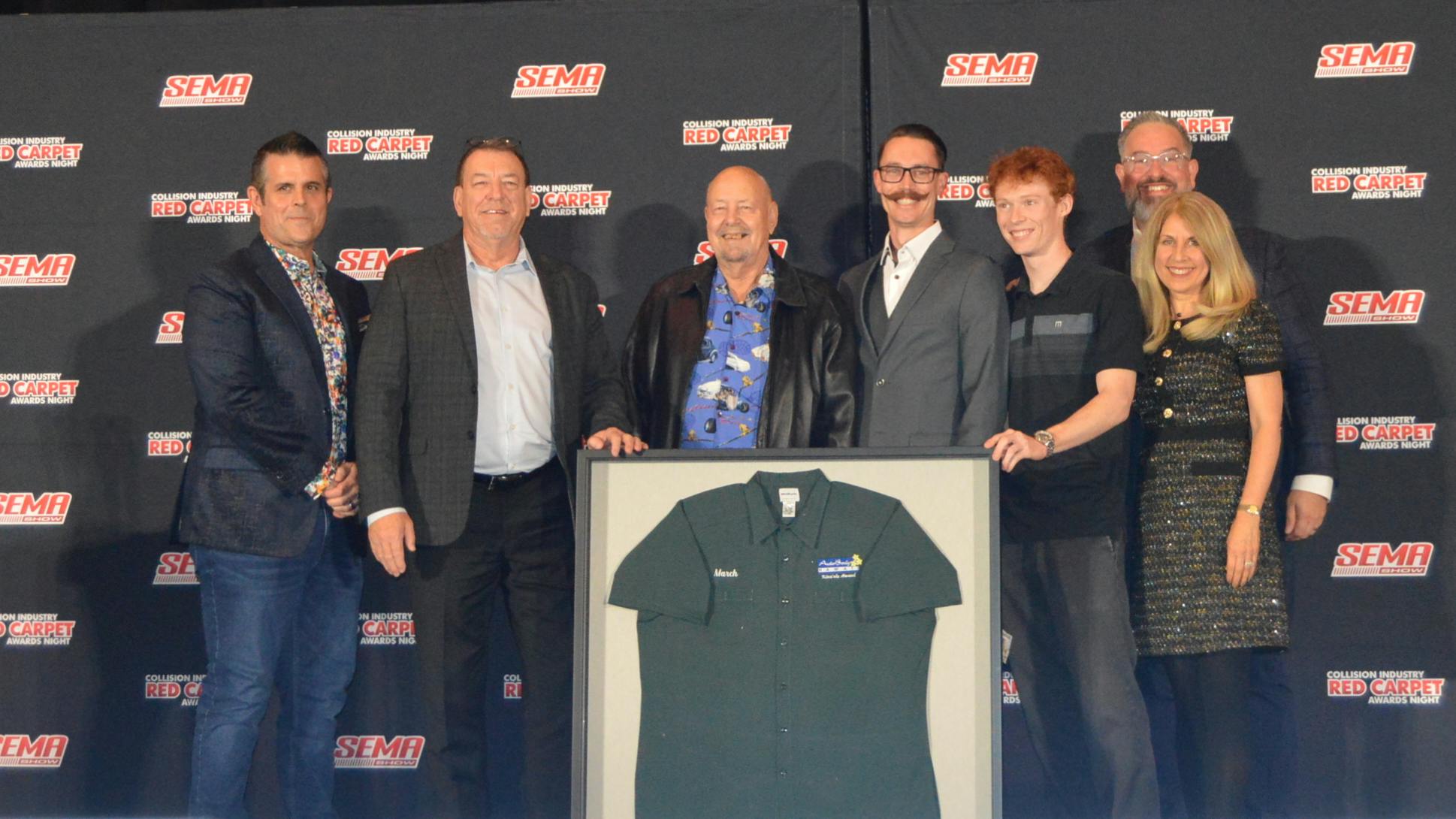 Tim Ronak, senior services consultant at AkzoNobel, celebrates with his family after receiving the 2025 March Taylor Kina&rsquo;ole Award.