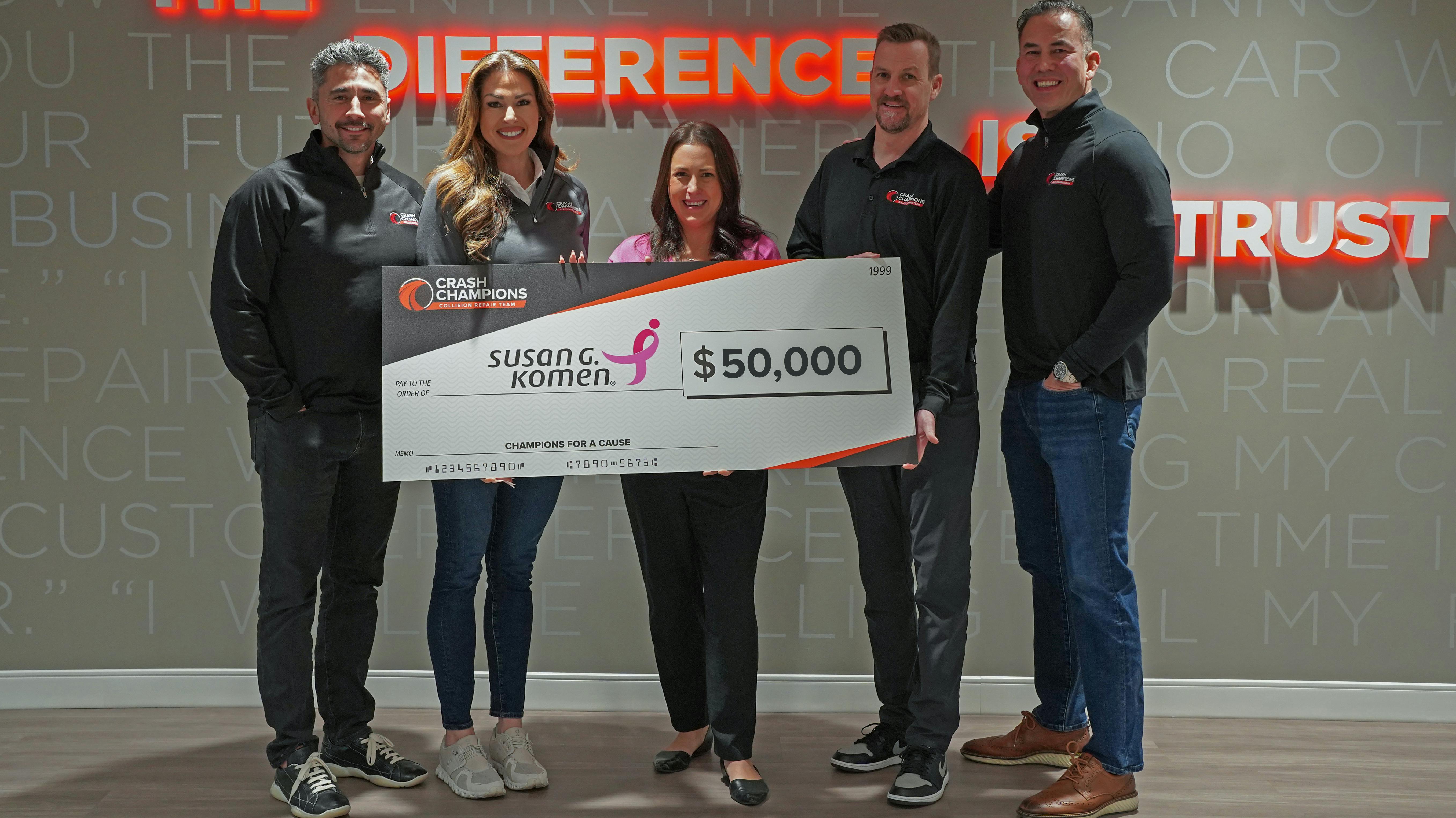 From left, Daniel Briones, Crash Champions chief marketing officer; Heidi Foster, Crash Champions SVP of Operations; Katherine Koyak, development director of Susan G. Komen Chicago; Ryan Downs, Crash Champions chief strategy officer; John Sheehan, Crash Champions SVP of Operations.