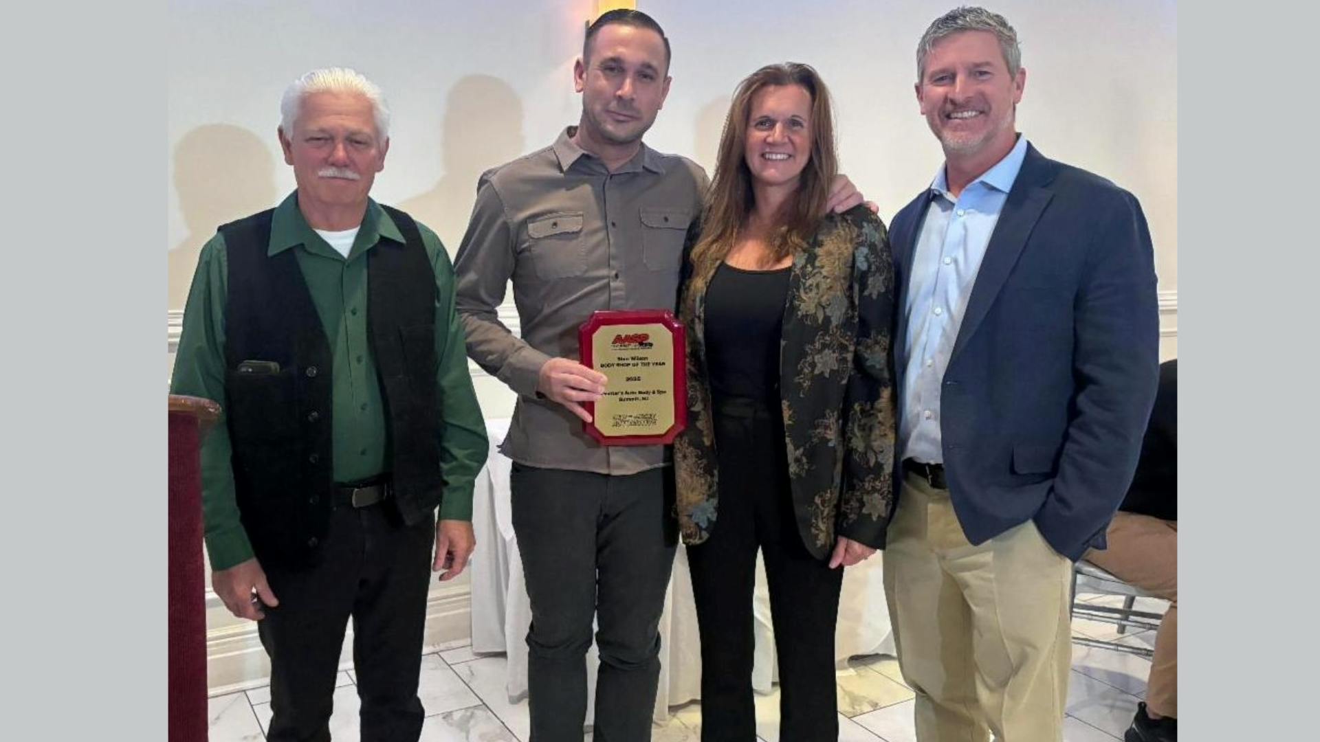 Stan Wilson/New Jersey Automotive Body Shop of the Year recipients Peotter's Auto Body and Spa with Jeff McDowell and Ken Miller.