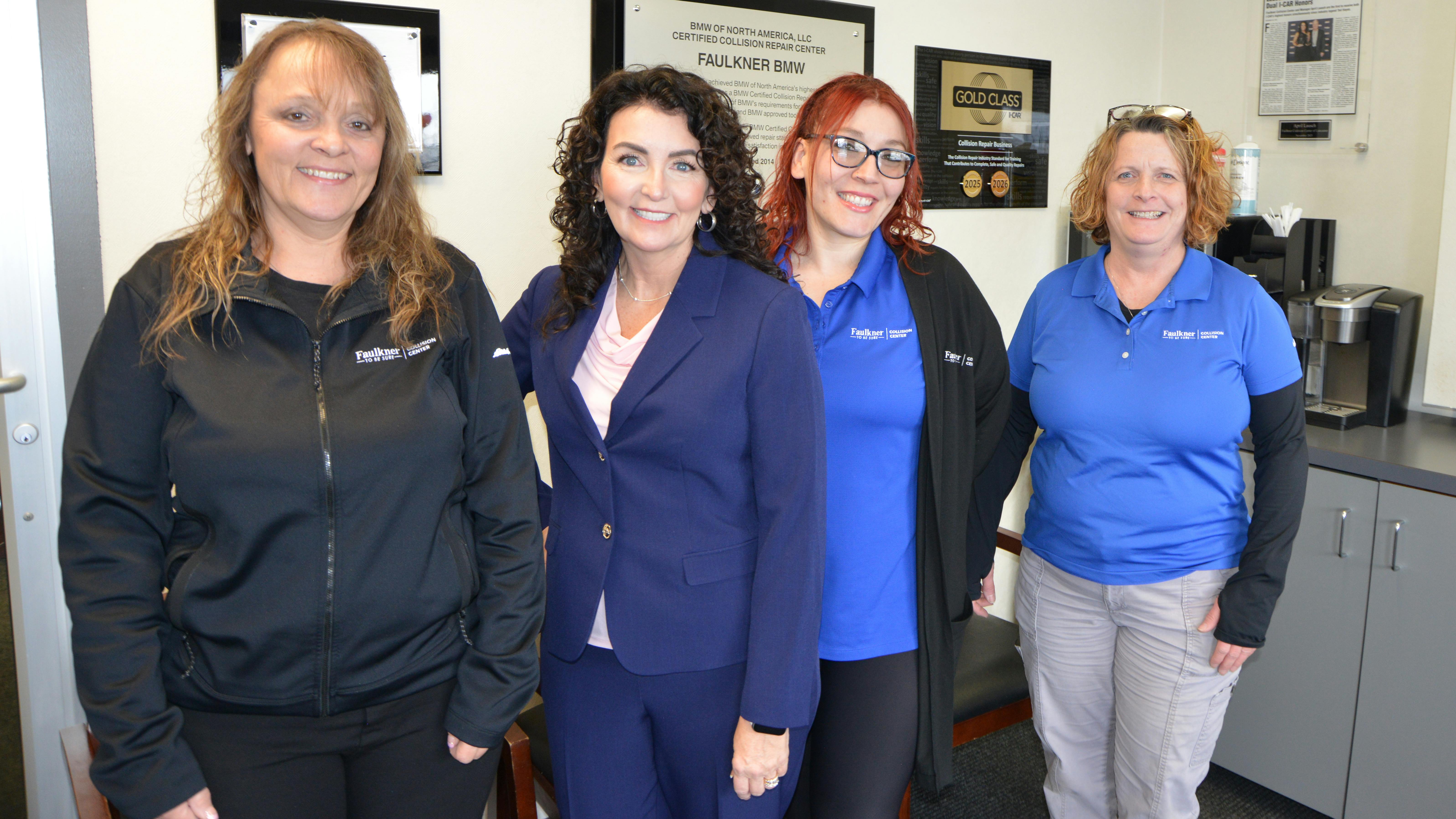 April Lausch (second from left) began her career in collision repair 30 years ago with no prior experience and quickly rose through the ranks due to her work ethic and dedication.